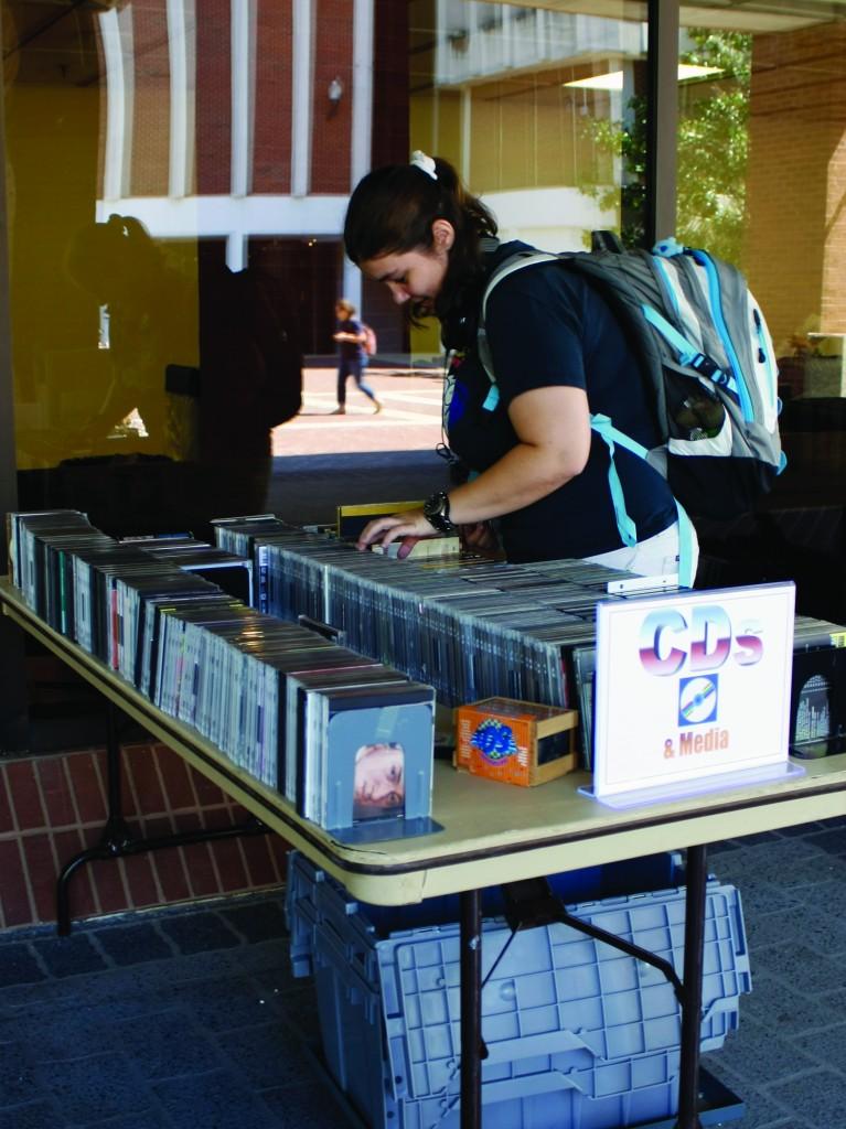 Old books, CDs, yearbooks and comics were available at the book sale this week. || Kristen Allen/The News