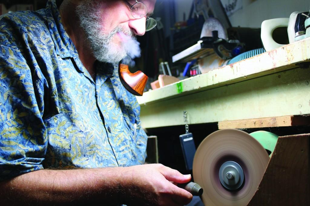 Chris Thile, instrument technician at Murray State works on a new pipe in his garage. His pipes are all handmade and the prices range anywhere from about $300 to $685. || Maddie Mucci/The News