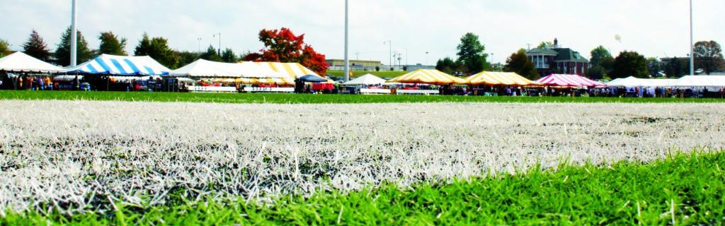 An array of brightly colored tents decorate the Roy Stewart Stadium at Murray States Homecoming. || Maddie Mucci/The News