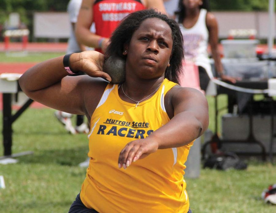 Sophomore Tonia Pratt, from Michigan Center, Mich., draws back to throw a shot put. She was one of four track team members to suffer minor injuries in the bus accident on Jan. 25. || Photo courtesy of Sports Information
