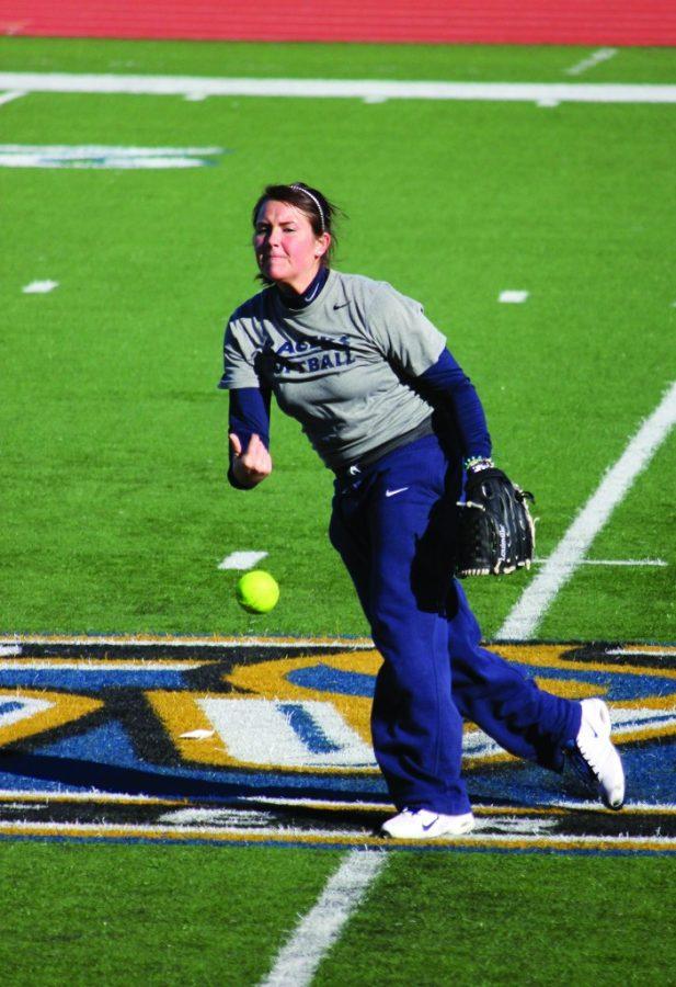 Senior infielder Christian Cox, from Magnolia, Ky., throws a practice pitch. The softball team will compete in the Magic City Classic today through Sunday. || Taylor McStoots/The News