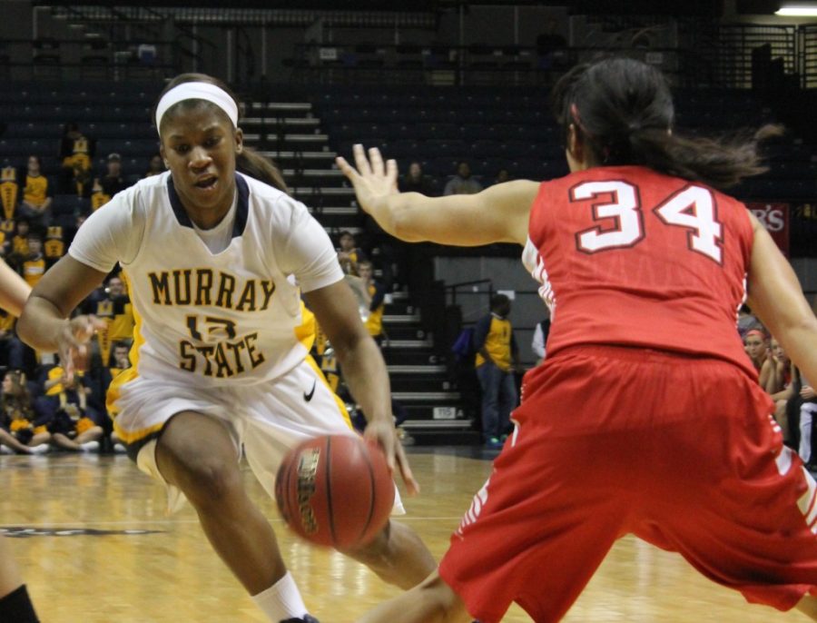 Sophomore guard Keiona Kirby sprints past two Southeast Missouri defenders. After finishing with a 16-3 overall record, the Racers fell out of the OVC?tournament in the first round. || Taylor McStoots/The News