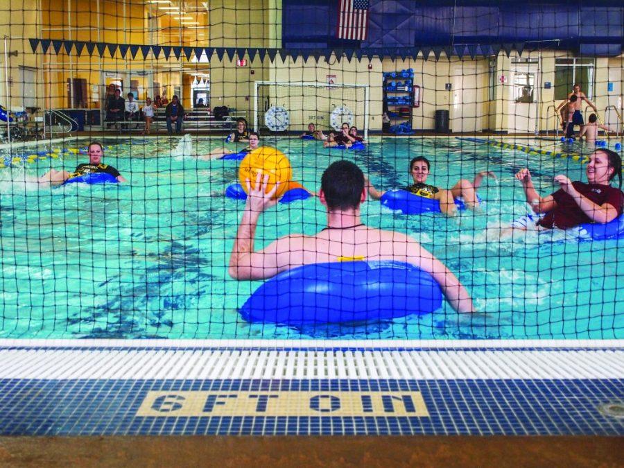 Students+participate+in+an+inner+tube+water+polo+match.+Because+the+new+sport+needs+the+pool+at+the+Susan+E.+Bauerfiend+Wellness+Center%2C+the++season+lasted+four+weeks+with+only+one+game+per+week.%7C%7C+Beamer+Barron%2FThe+News