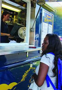 A Murray State student waits outside the mobile food truck, The Pony Express, for her lunch to be prepared.   Photo by Calvina Liebig / The News