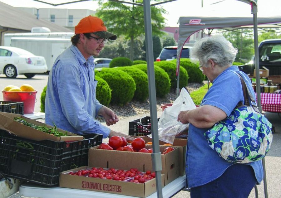 Lori Allen/The News
Maxine Pool of Murray purchases fresh vegetables from Wurth Farms.