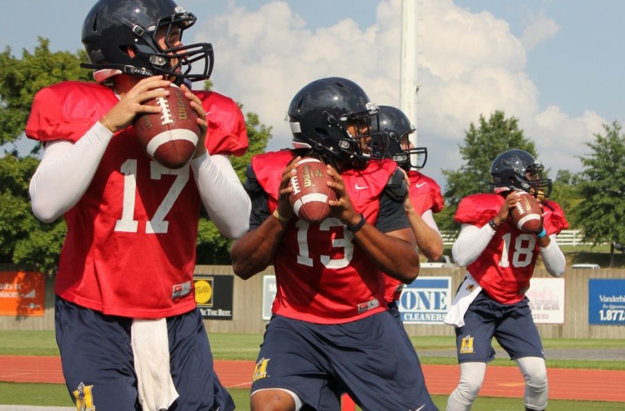 Sophomore Ole Miss transfer Maikhail Miller, no. 13, won the race for the starting quarterback earlier this week. He will get his first chance to lead the team when they travel to Missouri Aug. 30.  // Photo by Kate Russell / The News