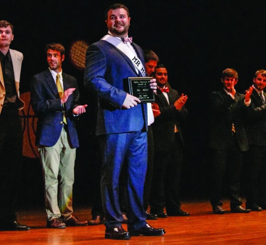 Taylor+McStoots%2FThe+News%0ATyler+Glosson+accepts+his+award+for+Mr.+MSU+2013.