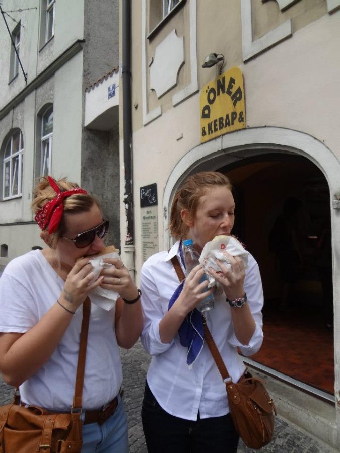 Kate Russell/The News
Two students enjoy food from a local restaurant in Regensburg, Germany.