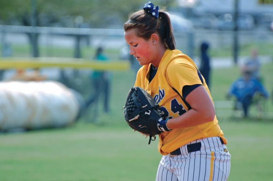 File photo
Junior CheyAnne Gaskey gets set before delivering a pitch from the mound during the Racers last spring scrimmage.