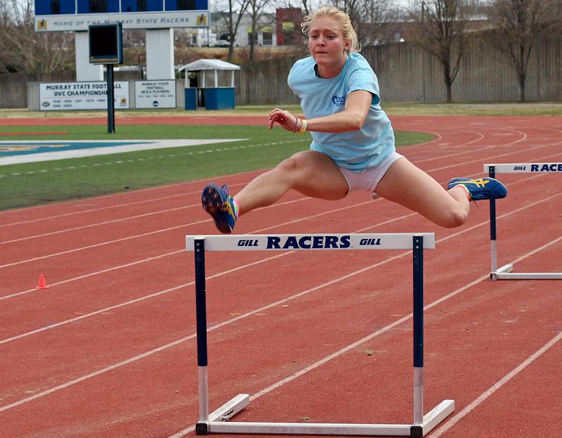 Jenny Rohl/The News
Sophomore Lauren Miller jumps hurdles at the Marshall Gage Track in Roy Stewart Stadium in an outdoor practice earlier this week.