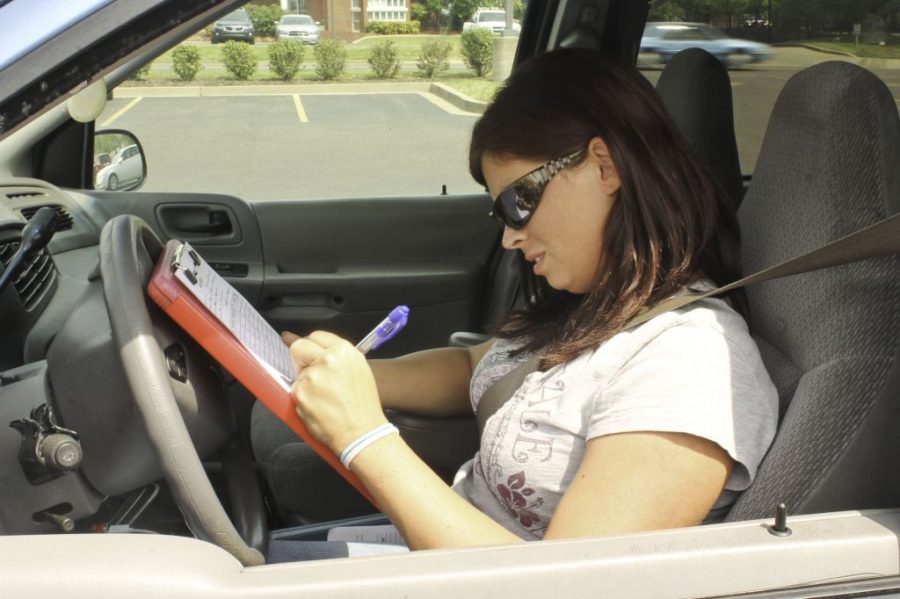 Kassity Winchester/Contributing photographer
One of Mama Nancy’s Cabs drivers, Alicia Woods, prepares for her shift.