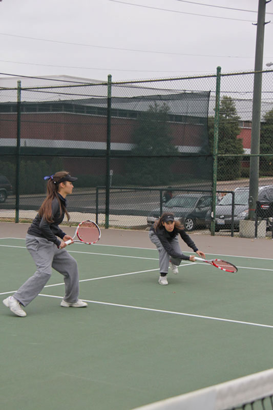 Lori+Allen%2FThe+News%0AFreshmen+twins+Eleonore+and+Virginie+Tchakarova+play+together+in+a+March+30+doubles+match+against+Southern+Illinois+University+Edwardsville.
