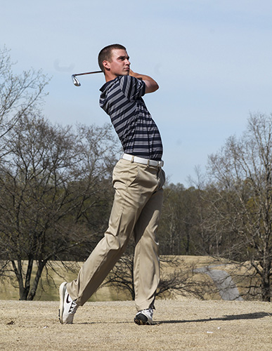 Jenny Rohl/The News
Junior Brock Simmons follows through a swing at Frances E. Miller Memorial Golf Course last season.