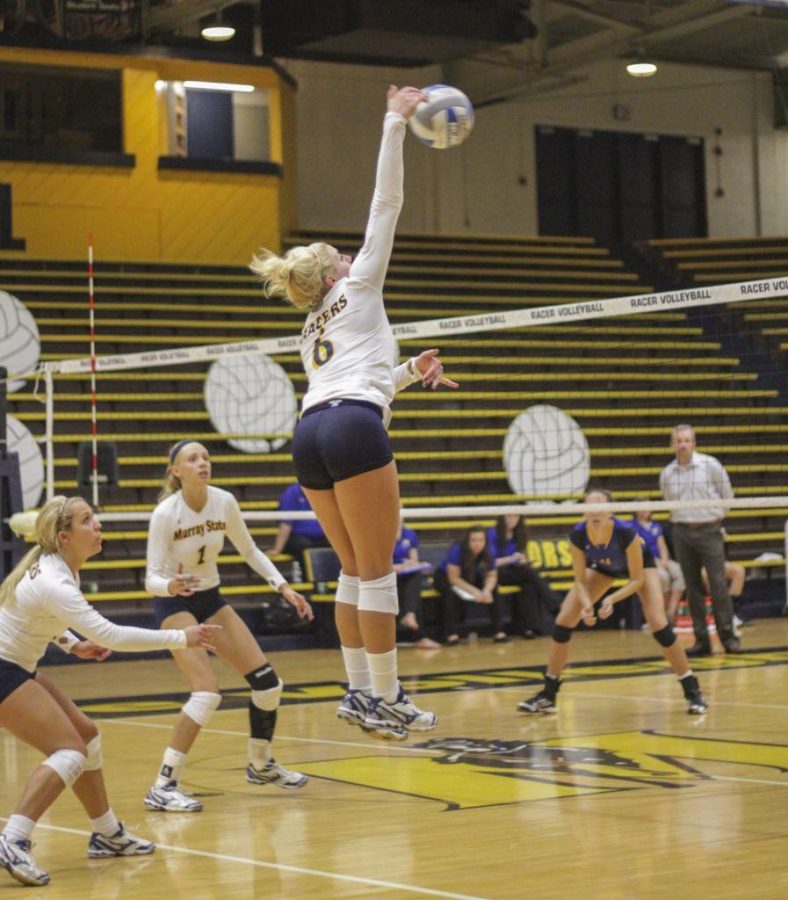 Lori Allen/The News
Senior Taylor Olden spikes the ball in a home game last season. Olden will continue her Racer career this year.