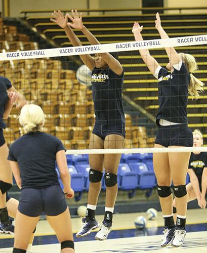 File Photo
Middle blockers practice at Racer Arena before starting OVC play.