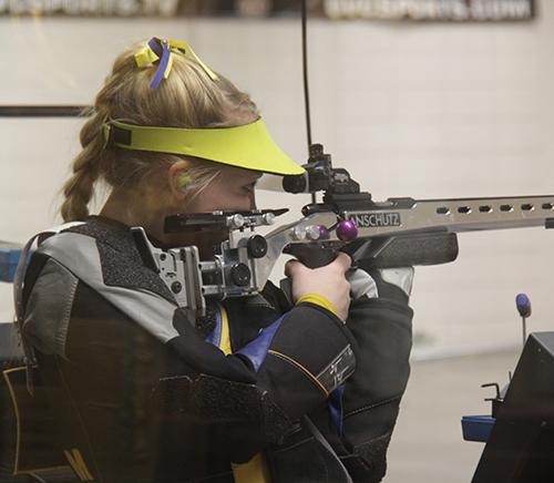File Photo
Junior Kaitlyn Wilson aims during a meet at Pat Spurgin Rifle Range in January 2014.