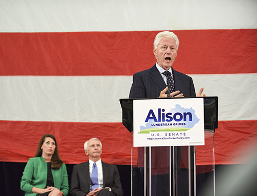 Kory Savage/The News
Formerpresident Bill Clinton speaks to a crowd in western Kentucky as congressional candidate Alison Lundergan Grimes and Gov. Steve Beshear watch from behind.