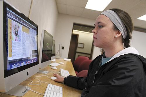 Jenny Rohl/The News
Taylor Thomas, senior from Eddyville, Ky., builds a graphic as a public relations major.