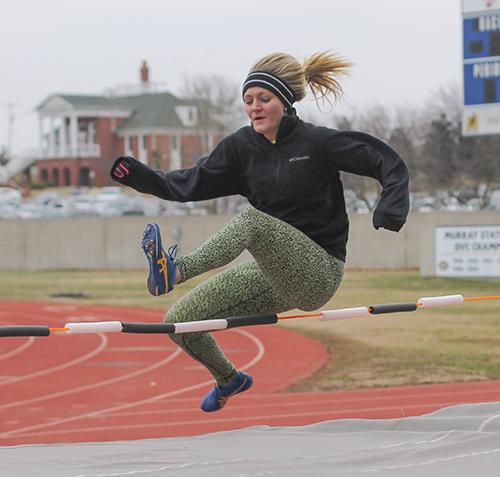 Jenny Rohl/The News
Lauren Miller, junior from Benton, Ky., high jumps for the first time at track and field practice.