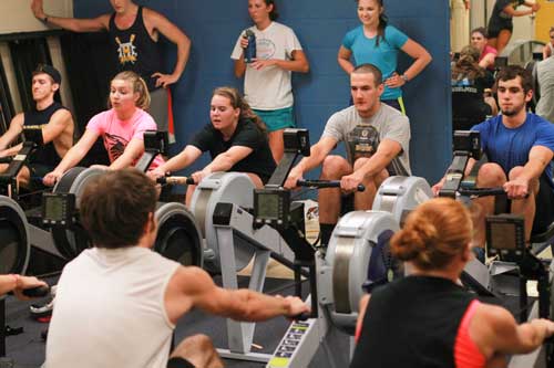 Jenny Rohl/The News
Members of the rowing team, one of the University’s four club sports, practice using rowing machines. 