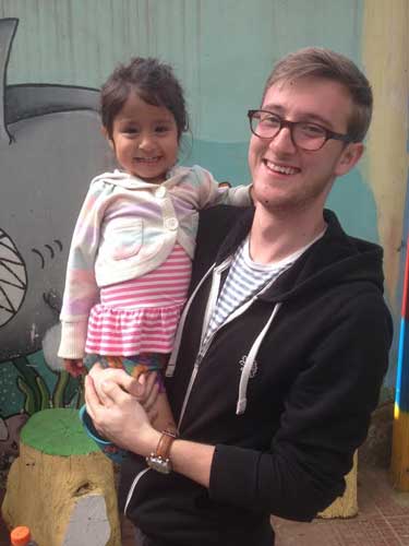Photo courtesy of Aaron Peck
Aaron Peck, senior from Shelbyville, Ky., poses with Hilda, a Guatemalan orphan.