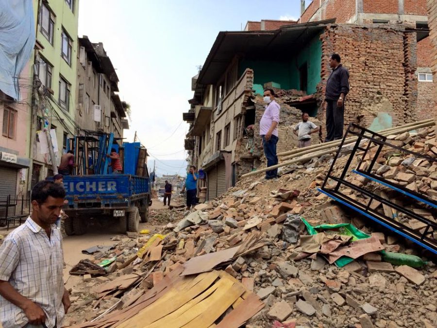 People+stand+on+rubble+after+the+second+earthquake+to+hit+Nepal+in+two+weeks.+Photo+courtesy+of+Ryan+Brooks.