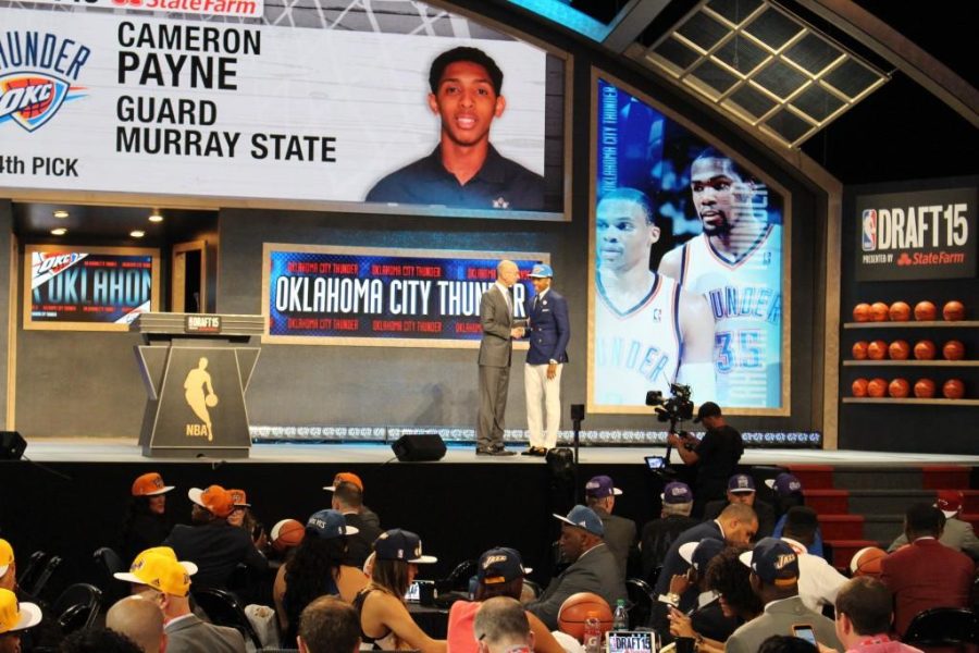 Mallory Tucker/The News
Cameron Payne shakes NBA Commissioner Adam Silvers hand after being picked 14th overall by the Oklahoma City Thunder.