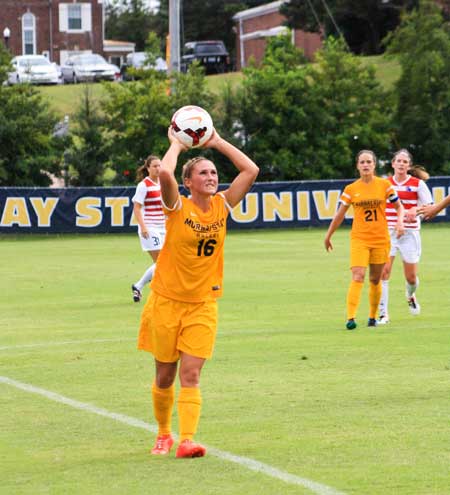 Kalli Bubb/The News
Racheal Foxley, senior defender and midfielder, throws the ball back into play during the Racers game against Louisiana Tech Friday.