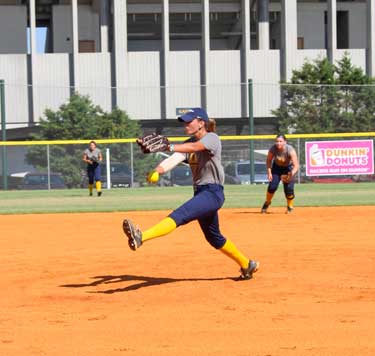 Nicole Ely/The News
Senior pitcher J.J. Francis pitches during a practice before their first fall game on Sept. 13