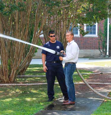 McKenna Dosier/The News
Josh Reed, graduate student from Harrisburg, Kentucky, learns to use a firehose.