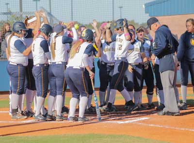Jenny Rohl/The News
The Racers celebrate the end of their fall season against Heartland Community College on Oct. 16.