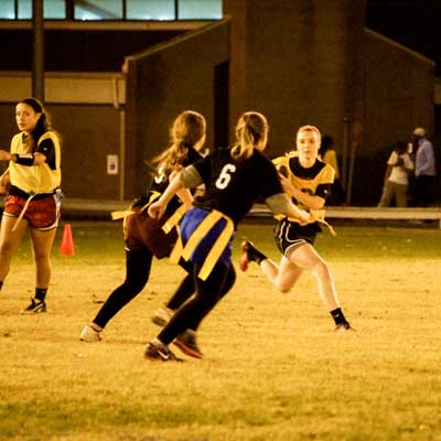 Zachary Maley/The News
Kathryn Goetz, junior from St. Louis runs against Kappa Delta Monday night during Flag Football.