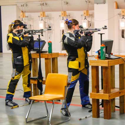 McKenna Dosier/The News
Rifle team members prepare to take their shot in Pat Spurgin rifle range. The team was bumped to fourth in the nation.