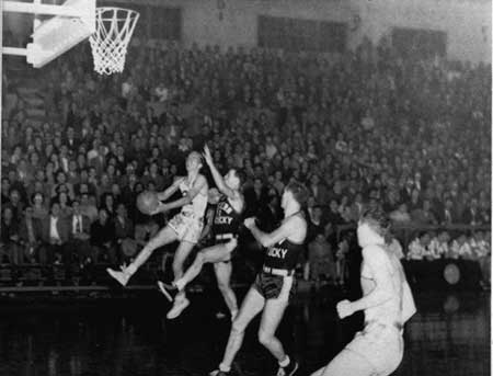 Photo courtesy of The Shield
Bennie Purcell goes up for a layup in his junior season. He and his son, Mel, became professional athletes.