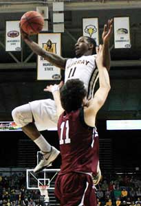 Kalli Bubb/The News
SALUKI LOSS: Damarcus Croaker, junior guard, jumps for a layup during their Dec. 18, 2015 game against the Southern Illinois University Carbondale Saluki’s.