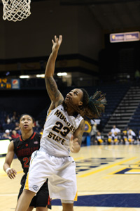 Nicole Ely/The News
Junior guard LeAsia Wright rebounds the ball against in Southeast Missouri State Saturday.