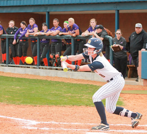 Jenny Rohl/The News
Junior outfielder and utility player, Cayla Levins bunts the ball during the Racers’ game against Evansville on March 17.