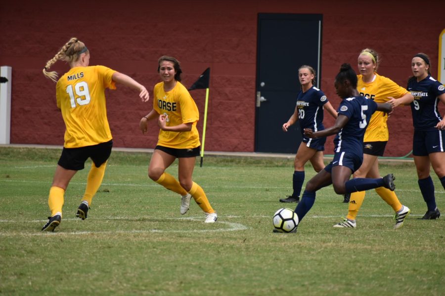 Junior forward Miyah Watford shoots to the opposite post to score her first goal of the game in the first half on Sundays game. (Photo by Gage Johnson/TheNews)