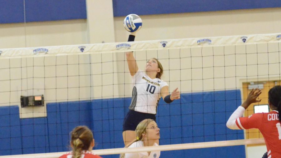 Junior outside hitter Rachel Giustino elevates for the ball. (Photo by Ron ORourke)