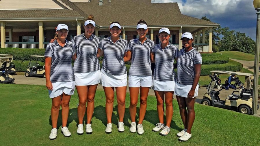 The womens golf team poses for a group photo after the Chris Bannister Classic. (Photo by Velvet Milkman/Racer Athletics)