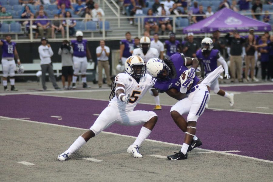 Junior Jason Johnson makes a tackle during the Racers week two game against Central Arkansas.