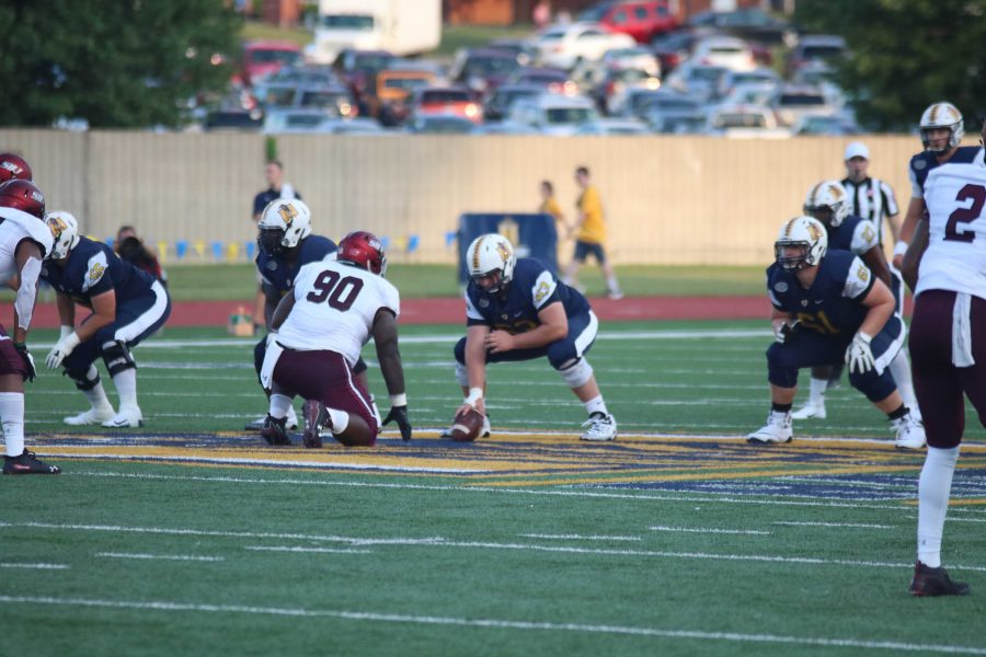 Levi Nesler prepares to snap the ball in the Racers opener against SIU. (Photo by Blake Sandlin)