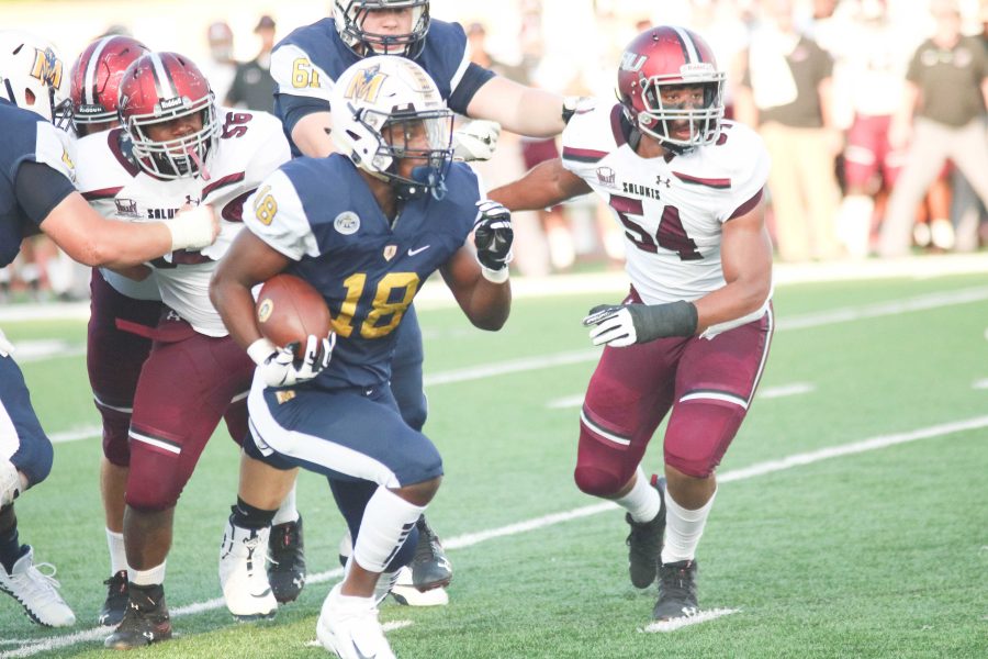 Racer running back Rodney Castille looks up the field on a first half run against SIU. (Photo by Blake Sandlin/TheNews)