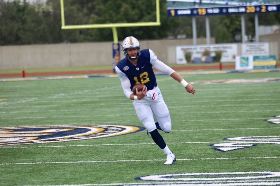 Senior quarterback Drew Anderson scrambles for a touchdown during the Racers game against Tennessee State. (Blake Sandlin/TheNews)