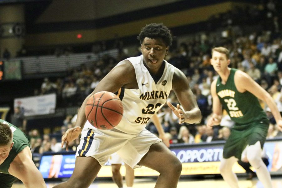 Junior forward Darnell Coward prepares to grab a pass in the Racers opener against Wright State. (Blake Sandlin/TheNews)