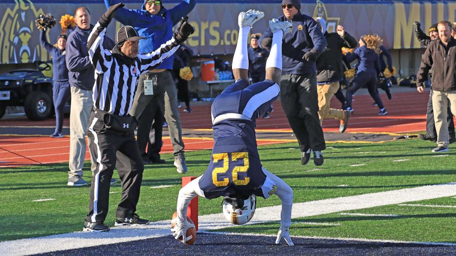 Malik Honeycutt caps off a 79-yard return for a touchdown with a flip into the end zone. (Courtesy of Dave Winder/Racer Athletics)