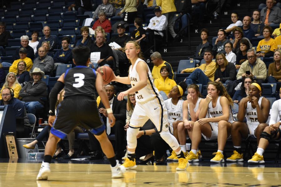 Freshman guard Macey Turley surveys the court during the Racers exhibition game against Lindsey Wilson. (Photo by Gage Johnson/TheNews)