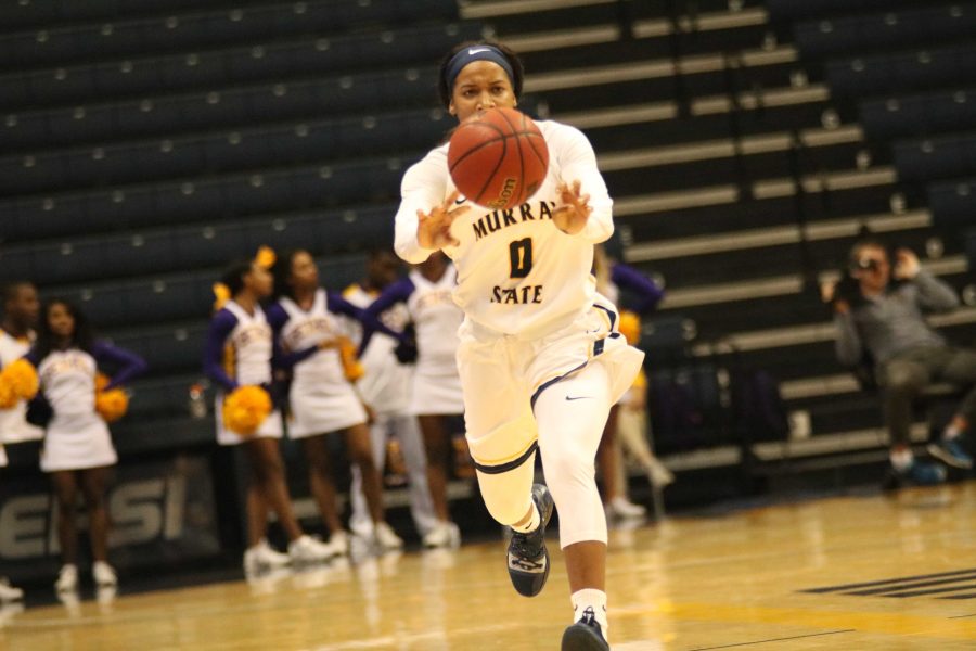 Sophomore guard Janika Griffith-Wallace makes a pass up-court in transition against Bethel University on Thursday, Dec. 13. (Blake Sandlin/TheNews)