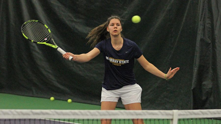 Junior Sara Loncarevic takes a swing at a ball during Murray States opening tournament. (Photo courtesy of Racer Athletics)