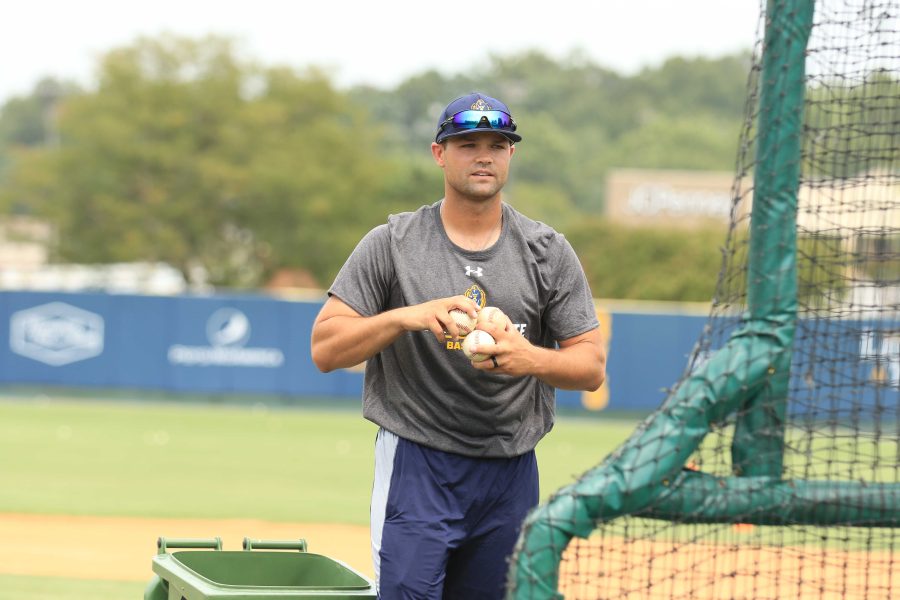 Head Coach Dan Skirka prepares to throw batting practice in the Fall. (Photo by Dave Winder/Racer Athletics)